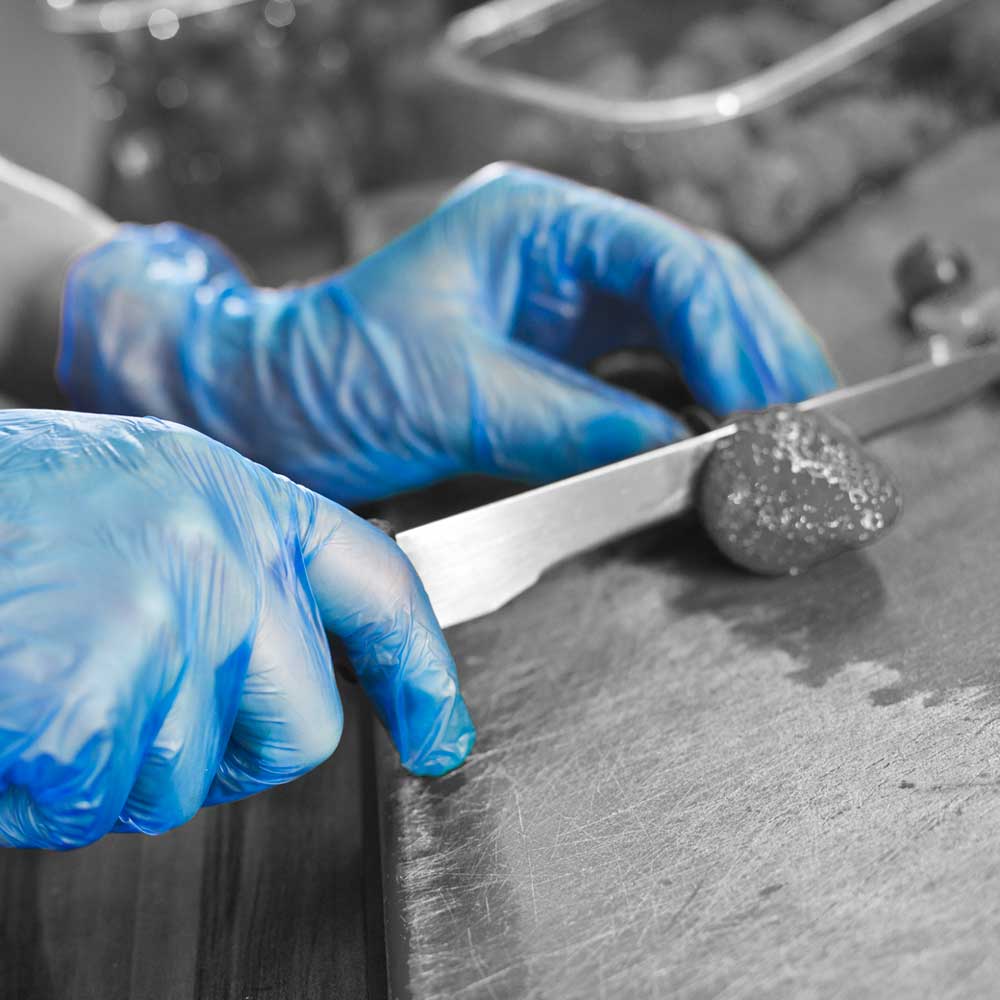 Blue UNICARE SOFT 4mil Vinyl Comfort Fit | Disposable Powder-Free Gloves